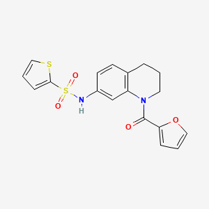 molecular formula C18H16N2O4S2 B2360175 N-[1-(furan-2-carbonyl)-3,4-dihydro-2H-quinolin-7-yl]thiophene-2-sulfonamide CAS No. 946267-66-9