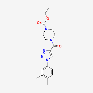 molecular formula C18H23N5O3 B2362030 ethyl 4-(1-(3,4-dimethylphenyl)-1H-1,2,3-triazole-4-carbonyl)piperazine-1-carboxylate CAS No. 1105215-21-1