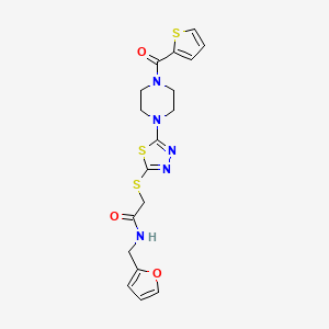 N-(furan-2-ylmethyl)-2-((5-(4-(thiophene-2-carbonyl)piperazin-1-yl)-1,3,4-thiadiazol-2-yl)thio)acetamide