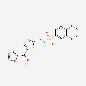 molecular formula C18H17NO6S2 B2369609 N-((5-(furan-2-yl(hydroxy)methyl)thiophen-2-yl)methyl)-2,3-dihydrobenzo[b][1,4]dioxine-6-sulfonamide CAS No. 1795442-22-6
