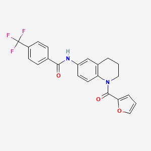 B2374525 N-[1-(2-furoyl)-1,2,3,4-tetrahydroquinolin-6-yl]-4-(trifluoromethyl)benzamide CAS No. 946289-10-7