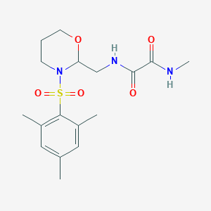 B2374767 N1-((3-(mesitylsulfonyl)-1,3-oxazinan-2-yl)methyl)-N2-methyloxalamide CAS No. 872976-06-2