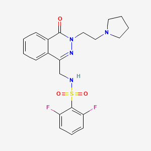 molecular formula C21H22F2N4O3S B2383066 2,6-difluoro-N-((4-oxo-3-(2-(pyrrolidin-1-yl)ethyl)-3,4-dihydrophthalazin-1-yl)methyl)benzenesulfonamide CAS No. 1448135-04-3