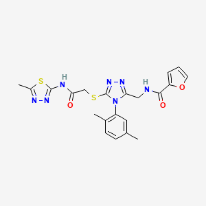 molecular formula C21H21N7O3S2 B2386080 N-((4-(2,5-dimethylphenyl)-5-((2-((5-methyl-1,3,4-thiadiazol-2-yl)amino)-2-oxoethyl)thio)-4H-1,2,4-triazol-3-yl)methyl)furan-2-carboxamide CAS No. 310450-65-8