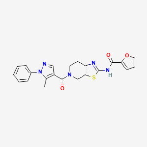 molecular formula C22H19N5O3S B2386572 N-(5-(5-methyl-1-phenyl-1H-pyrazole-4-carbonyl)-4,5,6,7-tetrahydrothiazolo[5,4-c]pyridin-2-yl)furan-2-carboxamide CAS No. 1351605-54-3