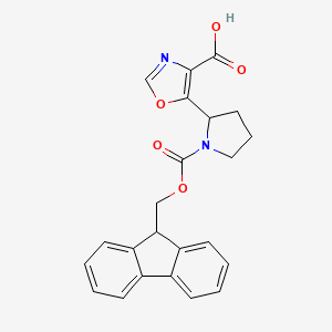 B2388930 5-[1-(9H-Fluoren-9-ylmethoxycarbonyl)pyrrolidin-2-yl]-1,3-oxazole-4-carboxylic acid CAS No. 2219371-91-0