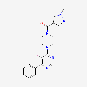 molecular formula C19H19FN6O B2389873 [4-(5-Fluoro-6-phenylpyrimidin-4-yl)piperazin-1-yl]-(1-methylpyrazol-4-yl)methanone CAS No. 2380060-43-3