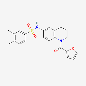 molecular formula C22H22N2O4S B2392092 N-[1-(furan-2-carbonyl)-1,2,3,4-tetrahydroquinolin-6-yl]-3,4-dimethylbenzene-1-sulfonamide CAS No. 946258-16-8