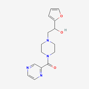 molecular formula C15H18N4O3 B2392226 (4-(2-(Furan-2-yl)-2-hydroxyethyl)piperazin-1-yl)(pyrazin-2-yl)methanone CAS No. 1396782-04-9