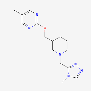 B2393155 5-Methyl-2-[[1-[(4-methyl-1,2,4-triazol-3-yl)methyl]piperidin-3-yl]methoxy]pyrimidine CAS No. 2379975-85-4