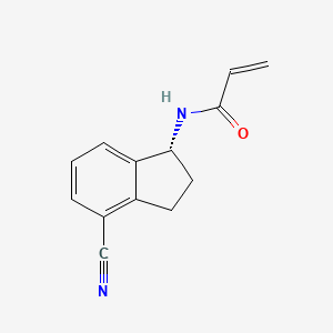 molecular formula C13H12N2O B2395803 N-[(1R)-4-Cyano-2,3-dihydro-1H-inden-1-yl]prop-2-enamide CAS No. 2411179-10-5
