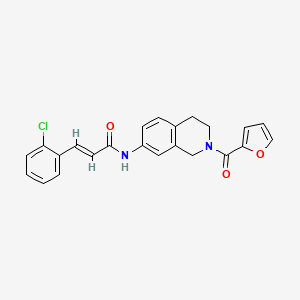 molecular formula C23H19ClN2O3 B2395819 (E)-3-(2-chlorophenyl)-N-(2-(furan-2-carbonyl)-1,2,3,4-tetrahydroisoquinolin-7-yl)acrylamide CAS No. 1251711-09-7