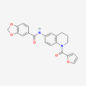 molecular formula C22H18N2O5 B2396777 N-[1-(furan-2-carbonyl)-1,2,3,4-tetrahydroquinolin-6-yl]-2H-1,3-benzodioxole-5-carboxamide CAS No. 946367-55-1