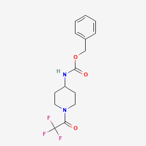 molecular formula C15H17F3N2O3 B2398726 1-(2,2,2-三氟乙酰)哌啶-4-基甲氨酸苄酯 CAS No. 1795823-01-6