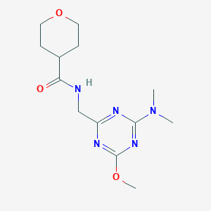 B2398784 N-((4-(dimethylamino)-6-methoxy-1,3,5-triazin-2-yl)methyl)tetrahydro-2H-pyran-4-carboxamide CAS No. 2034350-57-5