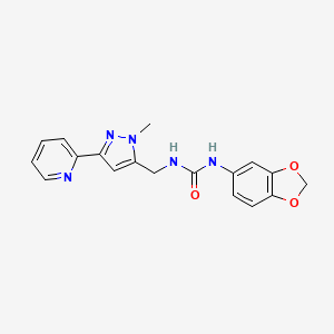 molecular formula C18H17N5O3 B2401736 1-(1,3-苯并二氧杂环-5-基)-3-[(2-甲基-5-吡啶-2-基吡唑-3-基)甲基]脲 CAS No. 2319719-42-9