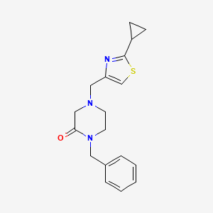 1-Benzyl-4-[(2-cyclopropyl-1,3-thiazol-4-yl)methyl]piperazin-2-one