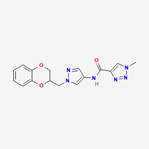molecular formula C16H16N6O3 B2404626 N-(1-((2,3-dihydrobenzo[b][1,4]dioxin-2-yl)methyl)-1H-pyrazol-4-yl)-1-methyl-1H-1,2,3-triazole-4-carboxamide CAS No. 1788557-53-8