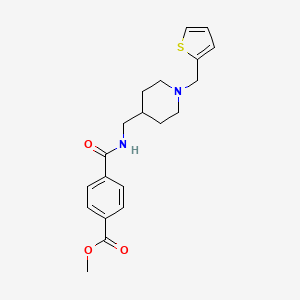 B2405335 Methyl 4-(((1-(thiophen-2-ylmethyl)piperidin-4-yl)methyl)carbamoyl)benzoate CAS No. 1211184-84-7
