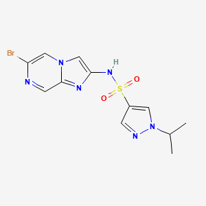 molecular formula C12H13BrN6O2S B2405619 N-(6-Bromoimidazo[1,2-a]pyrazin-2-yl)-1-propan-2-ylpyrazole-4-sulfonamide CAS No. 2224407-58-1