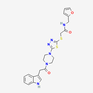 2-((5-(4-(2-(1H-indol-3-yl)acetyl)piperazin-1-yl)-1,3,4-thiadiazol-2-yl)thio)-N-(furan-2-ylmethyl)acetamide
