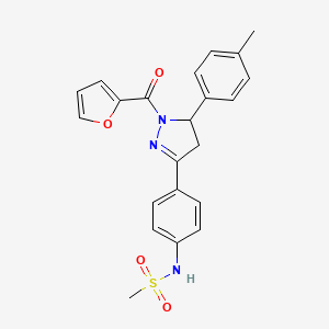 molecular formula C22H21N3O4S B2406351 N-{4-[1-(furan-2-carbonyl)-5-(4-methylphenyl)-4,5-dihydro-1H-pyrazol-3-yl]phenyl}methanesulfonamide 