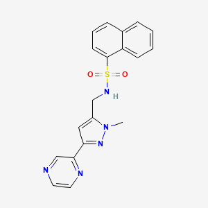 molecular formula C19H17N5O2S B2407096 N-((1-methyl-3-(pyrazin-2-yl)-1H-pyrazol-5-yl)methyl)naphthalene-1-sulfonamide CAS No. 2034603-36-4