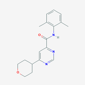 N-(2,6-Dimethylphenyl)-6-(oxan-4-yl)pyrimidine-4-carboxamide