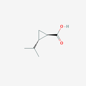 molecular formula C7H12O2 B2409484 (+/-)-trans-2-Isopropyl-cyclopropanecarboxylic acid CAS No. 1355058-91-1