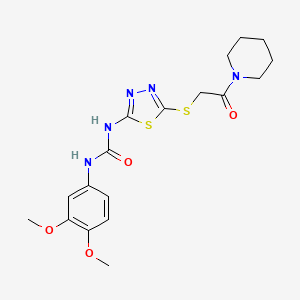 1-(3,4-Dimethoxyphenyl)-3-(5-((2-oxo-2-(piperidin-1-yl)ethyl)thio)-1,3,4-thiadiazol-2-yl)urea