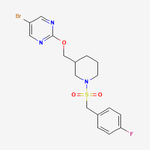 molecular formula C17H19BrFN3O3S B2412758 5-Bromo-2-({1-[(4-fluorophenyl)methanesulfonyl]piperidin-3-yl}methoxy)pyrimidine CAS No. 2379996-88-8