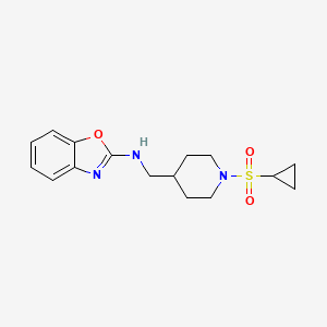 molecular formula C16H21N3O3S B2415650 N-[(1-Cyclopropylsulfonylpiperidin-4-yl)methyl]-1,3-benzoxazol-2-amine CAS No. 2379988-62-0