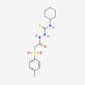 molecular formula C16H23N3O3S2 B2419400 N-[(cyclohexylcarbamothioyl)amino]-2-(4-methylbenzenesulfonyl)acetamide CAS No. 1023562-12-0