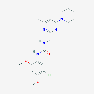 B2420887 1-(5-Chloro-2,4-dimethoxyphenyl)-3-((4-methyl-6-(piperidin-1-yl)pyrimidin-2-yl)methyl)urea CAS No. 1797077-71-4