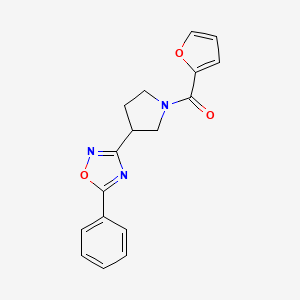 molecular formula C17H15N3O3 B2421181 Furan-2-yl(3-(5-phenyl-1,2,4-oxadiazol-3-yl)pyrrolidin-1-yl)methanone CAS No. 2034416-13-0
