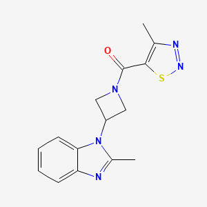 molecular formula C15H15N5OS B2422436 2-methyl-1-[1-(4-methyl-1,2,3-thiadiazole-5-carbonyl)azetidin-3-yl]-1H-1,3-benzodiazole CAS No. 2380086-60-0