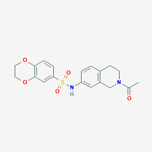 molecular formula C19H20N2O5S B2422562 N-(2-acetyl-1,2,3,4-tetrahydroisoquinolin-7-yl)-2,3-dihydro-1,4-benzodioxine-6-sulfonamide CAS No. 955747-65-6