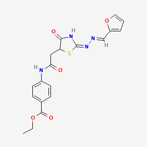 molecular formula C19H18N4O5S B2423448 ethyl 4-(2-((E)-2-((E)-(furan-2-ylmethylene)hydrazono)-4-oxothiazolidin-5-yl)acetamido)benzoate CAS No. 540762-87-6