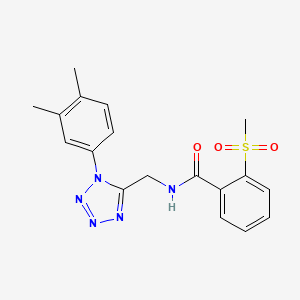 molecular formula C18H19N5O3S B2424279 N-{[1-(3,4-dimethylphenyl)-1H-1,2,3,4-tetrazol-5-yl]methyl}-2-methanesulfonylbenzamide CAS No. 933222-40-3
