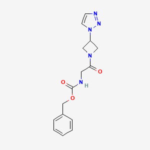 molecular formula C15H17N5O3 B2426034 benzyl (2-(3-(1H-1,2,3-triazol-1-yl)azetidin-1-yl)-2-oxoethyl)carbamate CAS No. 2034362-77-9
