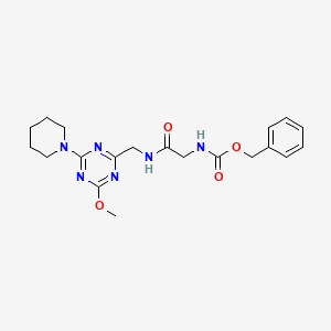 Benzyl (2-(((4-methoxy-6-(piperidin-1-yl)-1,3,5-triazin-2-yl)methyl)amino)-2-oxoethyl)carbamate