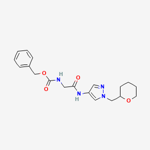 benzyl (2-oxo-2-((1-((tetrahydro-2H-pyran-2-yl)methyl)-1H-pyrazol-4-yl)amino)ethyl)carbamate