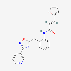 (E)-3-(furan-2-yl)-N-(2-((3-(pyridin-3-yl)-1,2,4-oxadiazol-5-yl)methyl)phenyl)acrylamide