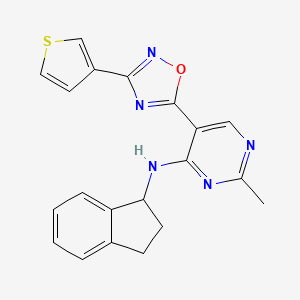 N-(2,3-dihydro-1H-inden-1-yl)-2-methyl-5-(3-(thiophen-3-yl)-1,2,4-oxadiazol-5-yl)pyrimidin-4-amine