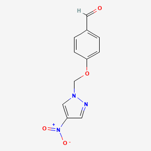 molecular formula C11H9N3O4 B2429908 4-[(4-nitro-1H-pyrazol-1-yl)methoxy]benzaldehyde CAS No. 1006953-87-2