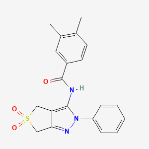 molecular formula C20H19N3O3S B2431122 N-{5,5-dioxo-2-phenyl-2H,4H,6H-5lambda6-thieno[3,4-c]pyrazol-3-yl}-3,4-dimethylbenzamide CAS No. 681265-74-7
