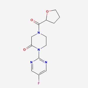 molecular formula C13H15FN4O3 B2432791 1-(5-Fluoropyrimidin-2-yl)-4-(oxolane-2-carbonyl)piperazin-2-one CAS No. 2320859-26-3
