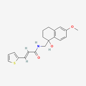 (E)-N-((1-hydroxy-6-methoxy-1,2,3,4-tetrahydronaphthalen-1-yl)methyl)-3-(thiophen-2-yl)acrylamide
