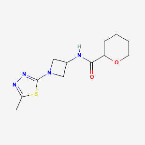 molecular formula C12H18N4O2S B2435831 N-[1-(5-Methyl-1,3,4-thiadiazol-2-yl)azetidin-3-yl]oxane-2-carboxamide CAS No. 2415553-31-8