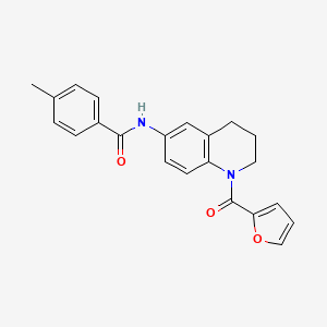 molecular formula C22H20N2O3 B2437571 N-[1-(furan-2-carbonyl)-1,2,3,4-tetrahydroquinolin-6-yl]-4-methylbenzamide CAS No. 946289-06-1